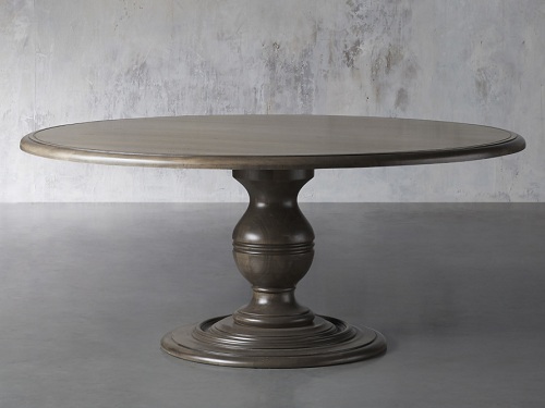 Dark stained round dining table